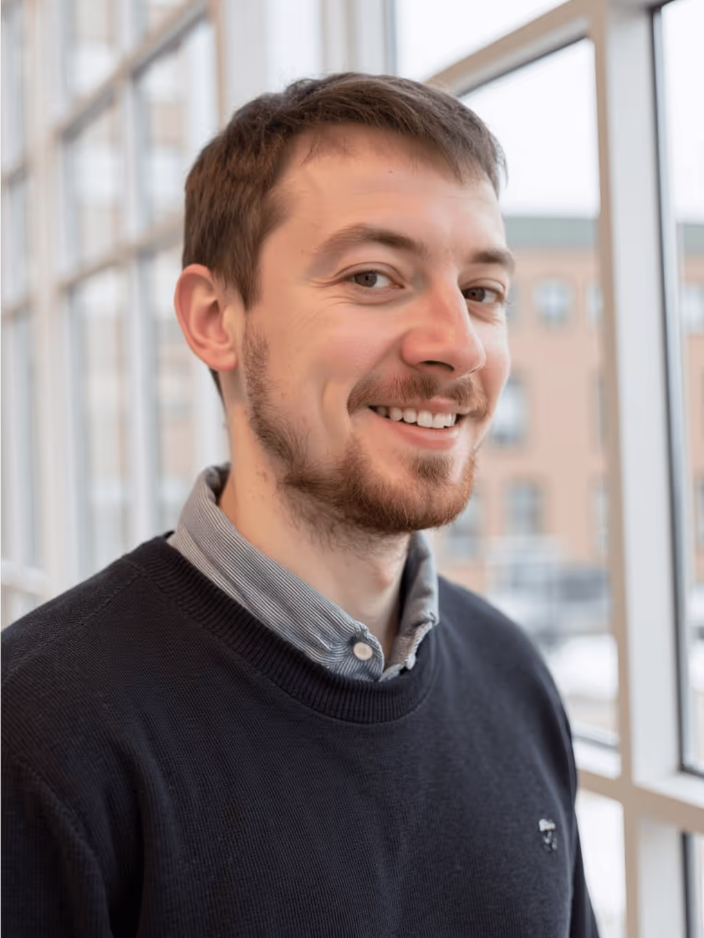 Portrait of Yury Kalennikau, Solution Architect at TIMVERO